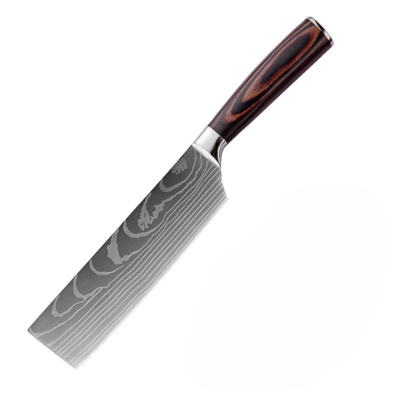 Steel kitchen knife set with wood handles by The Domestic Artifact, featuring multiple knives on a wooden kitchen countertop.